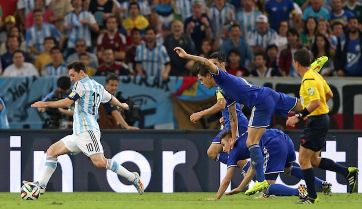 Messi off the mark as Argentina wins World Cup opener