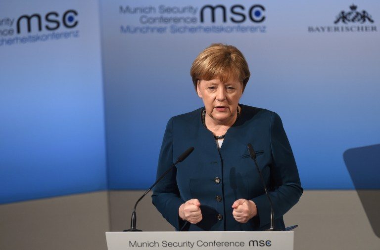 Merkel visits Algiers in bid to curb Africa migrant flow