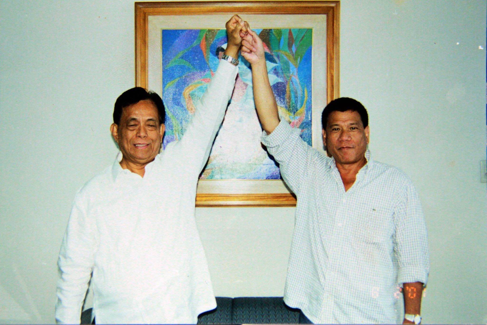 PDP-Laban. In this photo dated 2001, then-Davao City 1st District Representative Rodrigo Duterte took oath as a member of PDP-Laban before then-Senate President and Party Chairman Nene Pimentel Jr. Photo from Pimentel's Facebook 