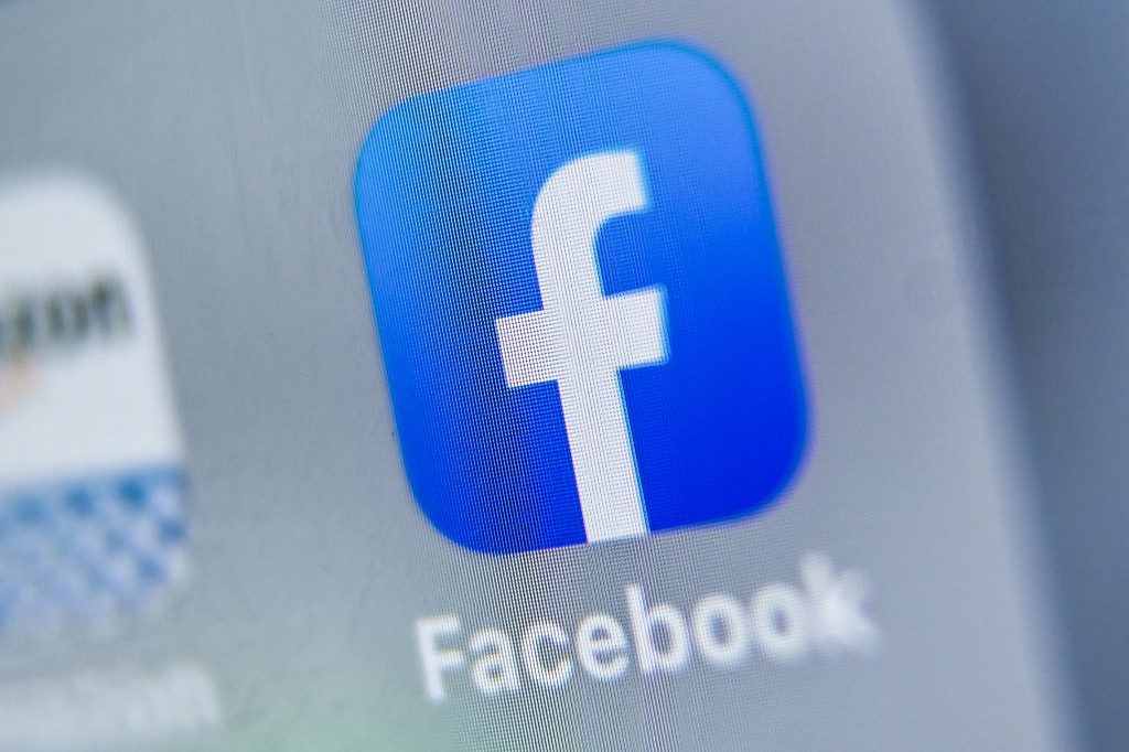 Facebook shares slip on possible U.S. antitrust move