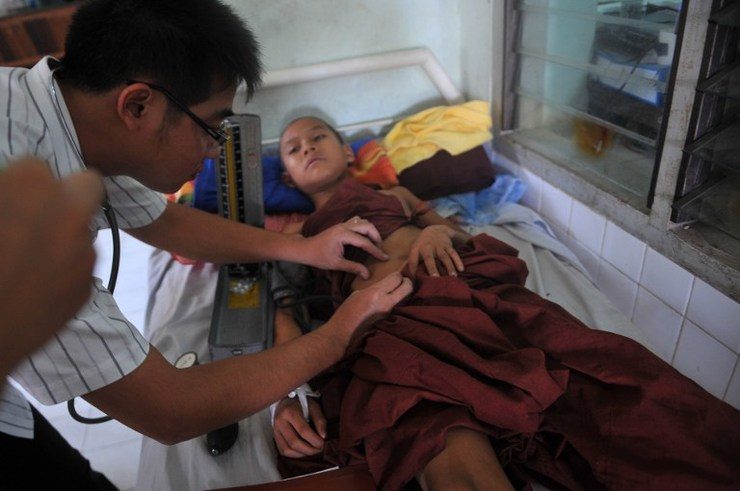 CHECK UP. A patient lays on a bed at the Mawlamyine Christian leprosy hospital in Mawlamyine taken on March 13, 2013. Ye Aung Thu/AFP