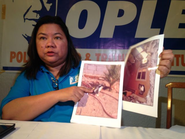 BOMBINGS NEAR NAJRAN. Toots Ople shows photos of a facility near the Filipino community in Najran, Saudi Arabia that was recently hit by a bomb. Photo by Mara Cepeda/Rappler 