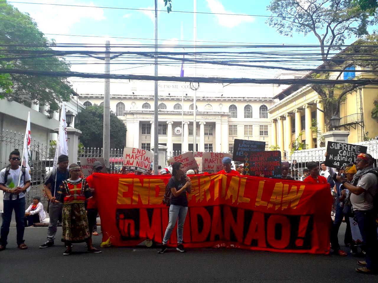 END MARTIAL LAW. A Lumad group holds banners calling for the end of martial law in Mindanao in front of the Supreme Court on January 22, 2019. Photo by Lian Buan/Rappler  