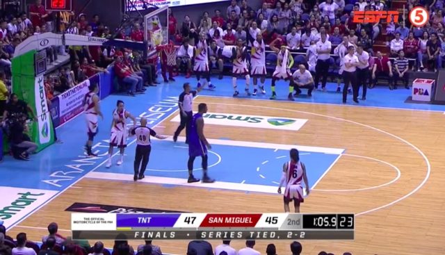 CAUGHT IN THE ACT. Arwind Santos draws flak from basketball fans on social media after being caught doing a monkey gesture towards Terrence Jones. Screenshot from ESPN5  
