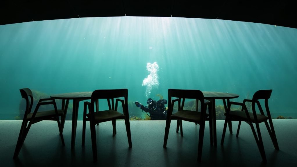 Descend, eat, and marvel at Europe’s first underwater restaurant