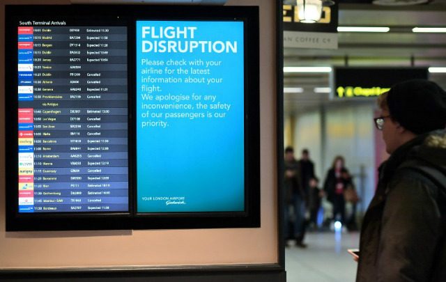 Two held over London airport drone chaos as flights resume