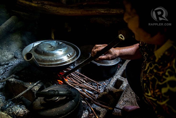 INDIGENOUS. Though LPG is available in their community, Josephine still prefers pine wood for cooking.