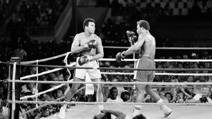 This photo taken on October 30, 1974 shows the fight between US boxing heavyweight champions, Muhammad Ali (L) and George Foreman in Kinshasa. File Photo by AFP