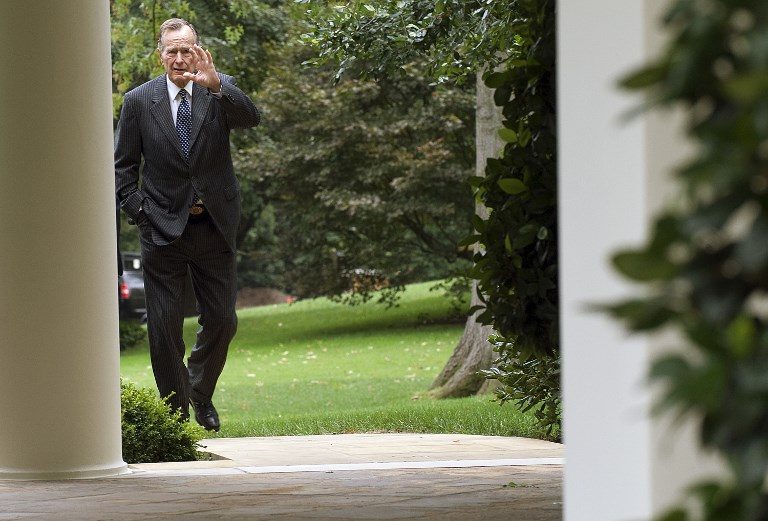 POST-PRESIDENCY. In a file photo taken on September 25, 2008, former President George H.W. Bush waves as he arrives at the White House to participate in US President George W. Bush's signing of S. 3406, the ADA (Americans With Disabilities) Amendments Act of 2008, at the White House in Washington, DC. Photo by Jim Watson/AFP 