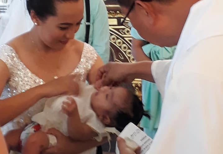 DOUBLE CELEBRATION. The couple also welcomes their youngest daughter to the Christian world. Photo from Tere Bañarez Bautista   