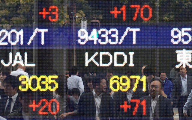 Asian stocks mostly down on US rates expectations