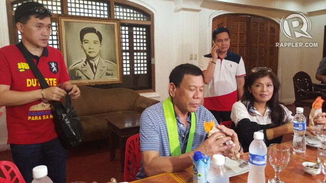MARCOS COUNTRY. President Rodrigo Duterte sits in front of a portrait of former president Ferdinand Marcos and beside Ilocos Norte Governor Imee Marcos during the 2016 campaign period. File photo by Pia Ranada/Rappler  