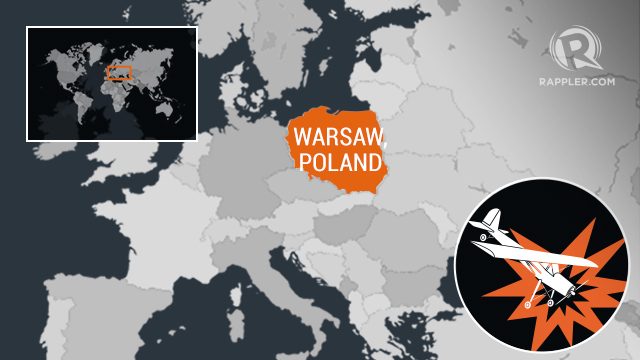 German stunt pilot dies in river crash at Polish air show