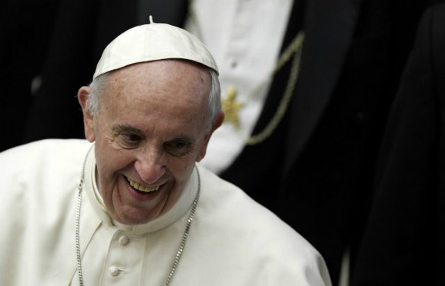 Pope tells Vatican to put women, lay experts into top jobs