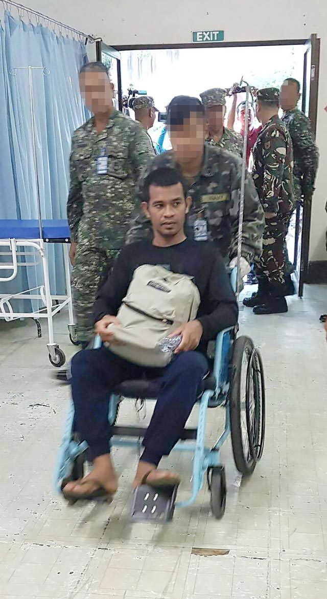 FREE. Herman Bin Manggak is turned over to the military on Thursday, September 22. Photo obtained by Rappler  