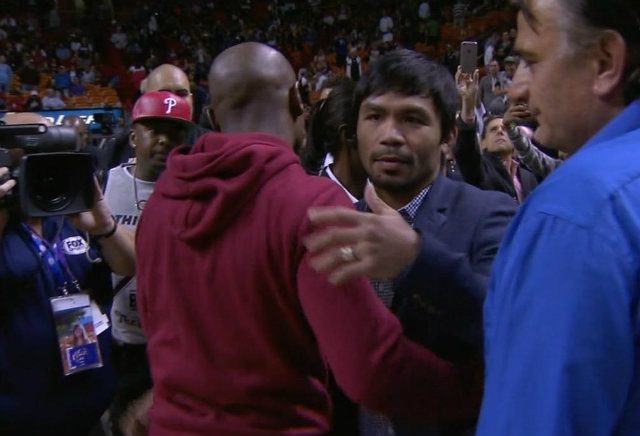 WATCH: Pacquiao, Mayweather meet at Miami Heat game