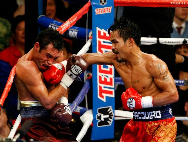 The last time Manny Pacquiao was a significant underdog was his 2008 win against Oscar de la Hoya. Gerry Penalosa thinks we'll see a similar situation in Pacquiao's next outing as an underdog. Photo by Ethan Miller/Getty Images/AFP
 