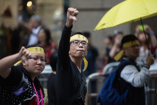 Hong Kong authorities plan to take action at protest sites