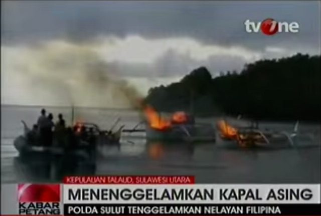 DESTROYED. Boats owned by Filipino fishermen destroyed by the Indonesian Navy in North Sulawesi in December 2014 after being caught illegally fishing. Screenshot from Youtube video.  