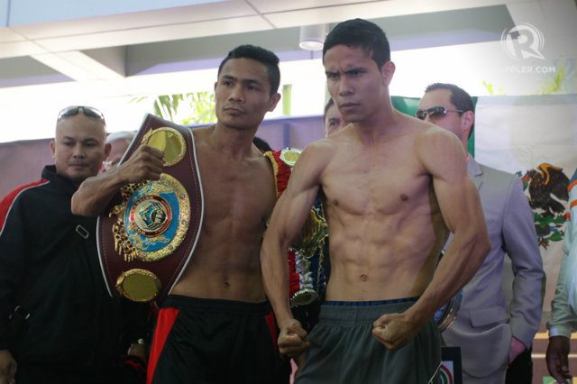 Donnie Nietes and Gilberto Parra became heated at the scale. Photo by Mark Cristino 