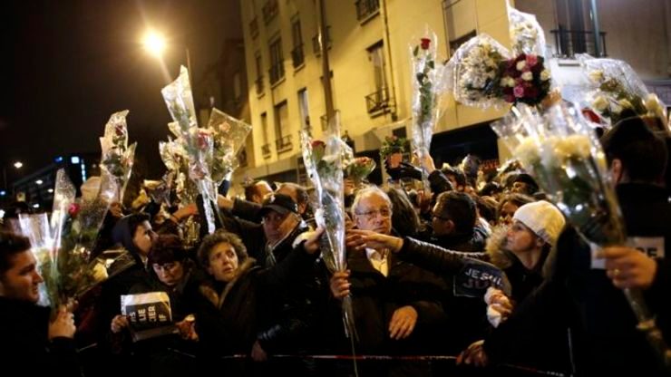 French rally for attack victims on eve of Paris march of ‘millions’