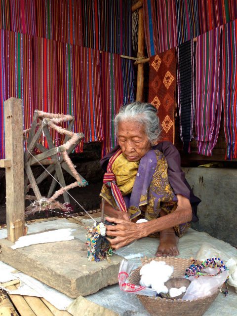 TRADITIONAL WEAVING. See local women weaving beautiful sarongs at Sade Village in Lombok. 