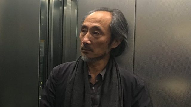 Exiled China author in Hong Kong as arts center agrees to host talks