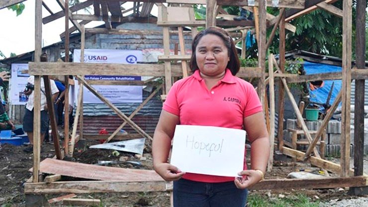 HOPEFUL. 38-year-old Agnes Garteli is a Barangay kawagad of Barangay 62-A. Despite a few meters from the coast, her area registered zero casualty. Photo by Jodesz Gavilan/Rappler