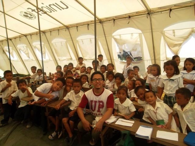 HOPE. The author with students in a makeshift classroom. Photo courtesy of Alfred John Tayona