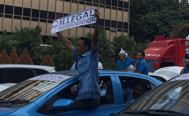 IN PHOTOS: Angry Jakarta taxi drivers violently protest ride-hailing apps