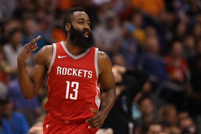 THREE. James Harden #13 of the Houston Rockets reacts to a three point shot in this file photo. Photo by Christian Petersen/Getty Images/AFP 