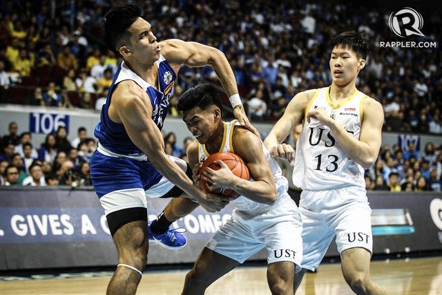 MIGHTY EAGLES. Thirdy Ravena and the Ateneo Blue Eagles hold off Mark Nonoy and the UST Growling Tigers in the title series. Photo by Josh Albelda/Rappler 