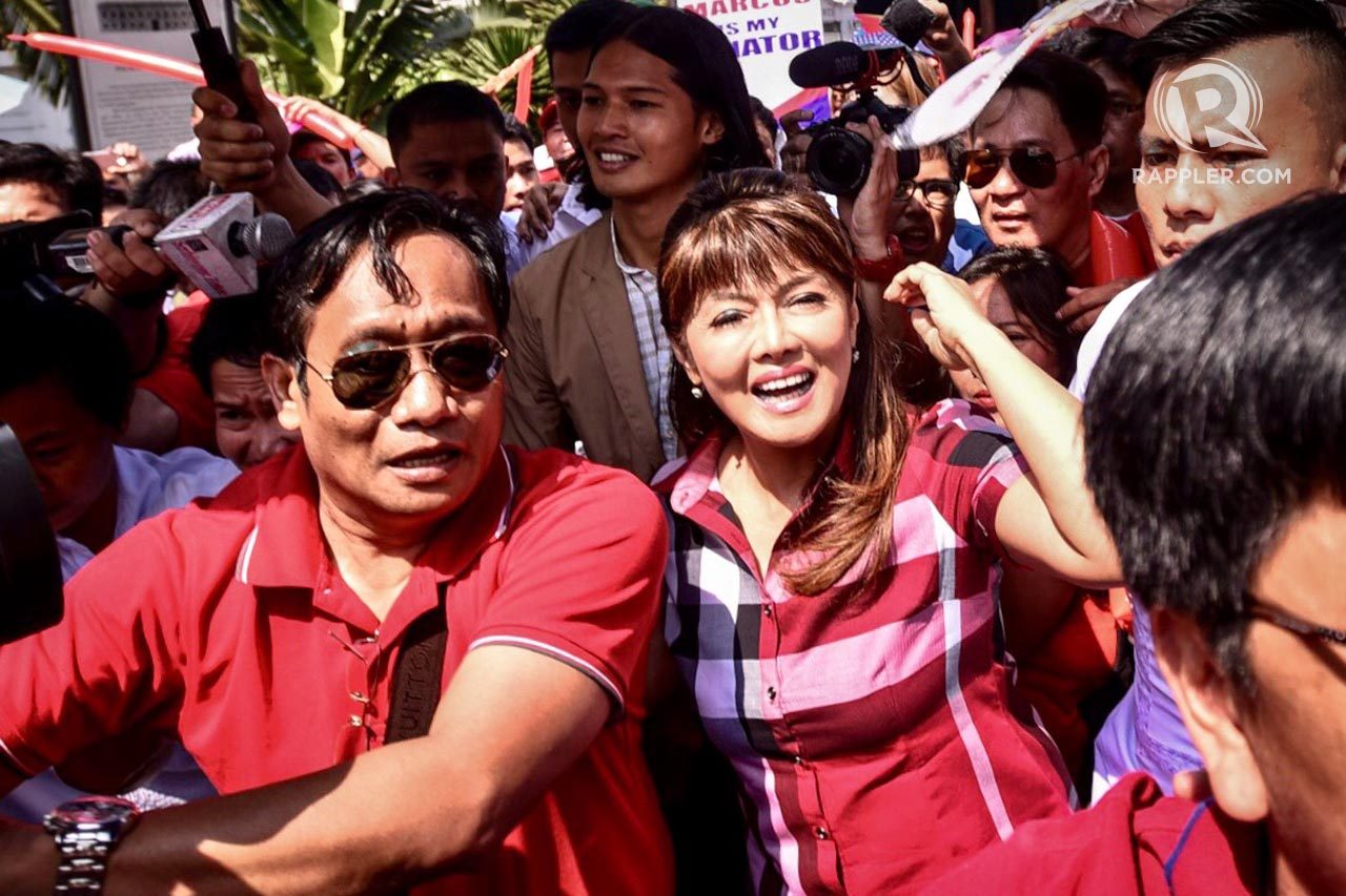 WATCH: Comelec crowds jeer at Imee Marcos, loyalists shout back