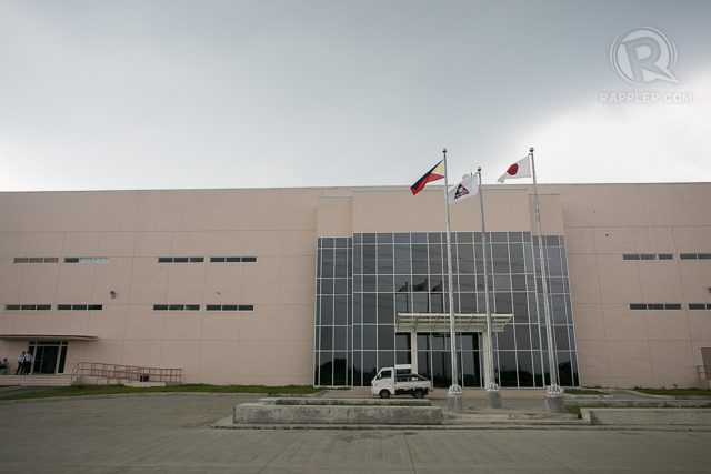 PARTNERSHIP. The Philippine and Japanese flags fly in front of Aruze gaming's 650,000 square meter facility in Santo Tomas, Batangas.  