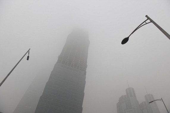 Beijing declares first-ever red alert for pollution