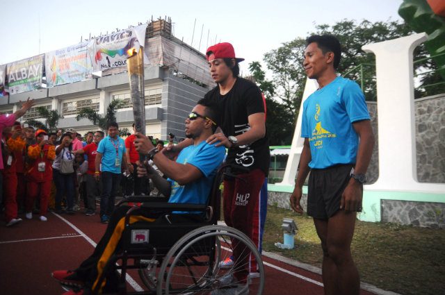 WATCH: First PWD torchbearer and Terrence Romeo open Palaro