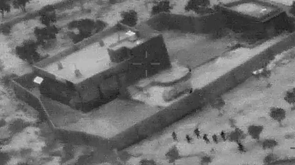 GROUND ZERO. This still image from video released by the US Department of Defense on October 30, 2019, shows US forces (lower right) advancing on the compound of ISIS leader Abu Bakr al-Baghdadi in Syria on October 26, 2019. Photo by Jose Romero/US Department of Defense/AFP  