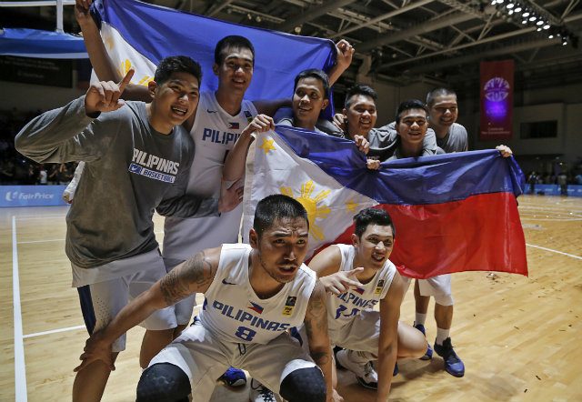Top: Prince Rivero, Troy Rosario, Baser, Amer, Earl Scottie Thompson, Jiovani Jalalon, Norbert Torres, Glenn Khobuntin and Kevin Ferrer celebrate their gold medal win. Photo by Singapore SEA Games Organising Committee/Action Images via Reuters  