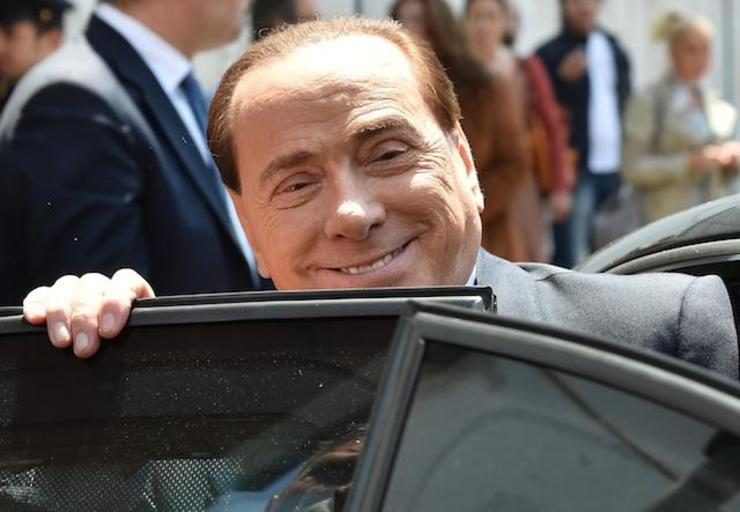 Berlusconi, freed from sex-trial woes, dreams of political comeback