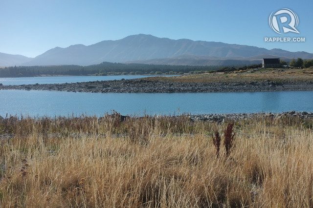 TEKAPO. Views of the lake from a bike trail include a historic chapel 