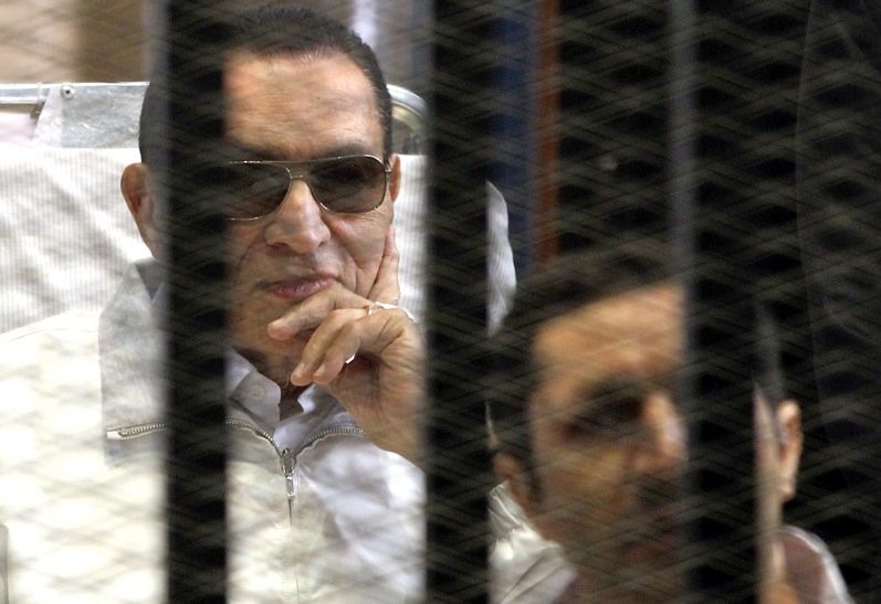 Egypt court frees Mubarak sons pending corruption retrial