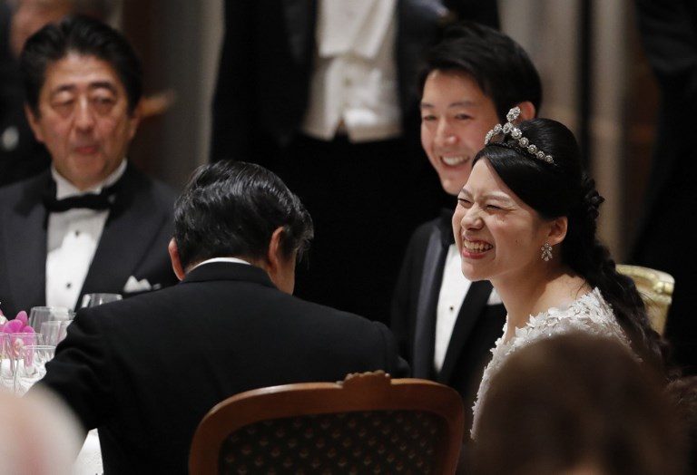 RECEPTION. Japan's former princess Ayako Moriya (right) and her husband Kei Moriya (second right) talk with Crown Prince Naruhito as Prime Minister Shinzo Abe looks on at their wedding banquet in Tokyo on October 30, 2018. Photo by Toru Hanai/POOL /AFP  