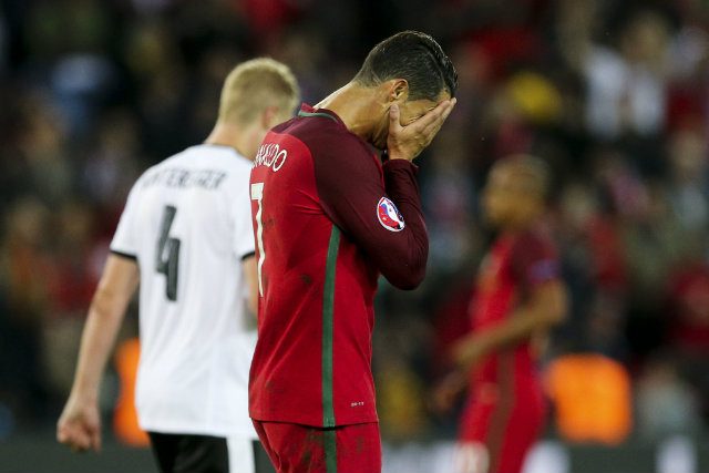 DISAPPOINTED. Portugal Cristiano Ronaldo reacts after missing a penalty during the UEFA EURO 2016 group F preliminary round match between Portugal and Austria. Photo by MIGUEL A. LOPES/EPA 