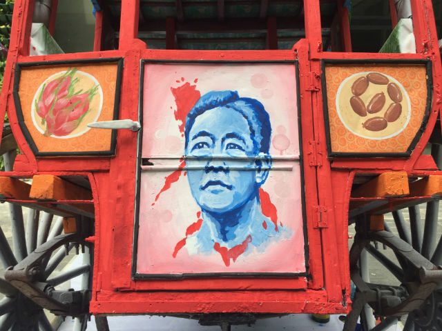 BIRTHDAY CELEBRANT. The face of former President Ferdinand Marcos is painted on a kalesa during a kalesa painting contest in Laoag City, Ilocos Norte on September 9. Photo by Mara Cepeda/Rappler 