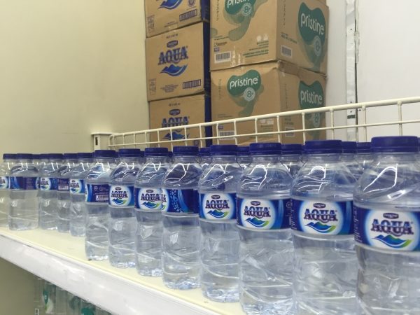 Counterfeiter sells purified water bottles filled with well water