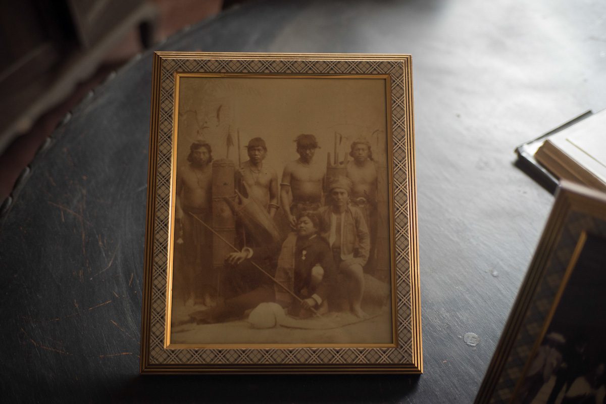 EXPOSITION. A framed photo of the family's ancestor, Gobernadorcillo Ismael Alzate y Astudillo, with Igorots presented at the Exposicion de las Islas Filipinas in Madrid, Spain, in 1887, which infuriated Dr Jose Rizal. Photo by Maverick Asio  