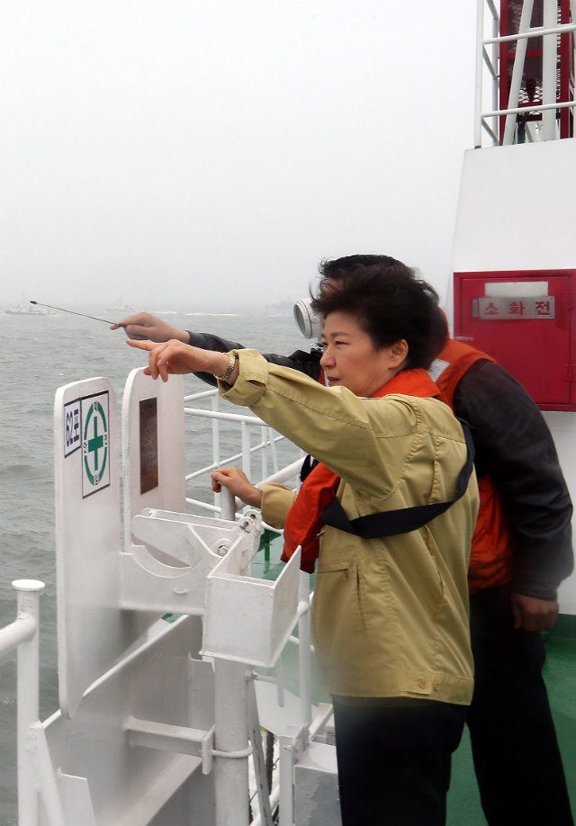 MURDER? South Korean President Park Geun-hye looks at the site of the sinking of the Incheon-Jeju Island ferry Sewol from a Coast Guard ship in waters off South Korea's southwestern island of Jindo on April 17, 2014. File photo by YNA/EPA