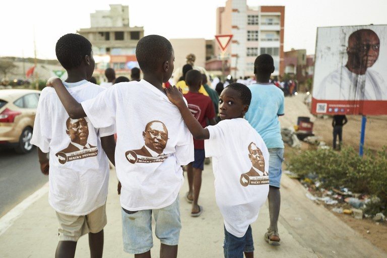 Senegal heads to polls with president confident of victory