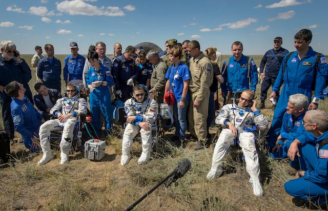 Three astronauts touch down after 6 months in space