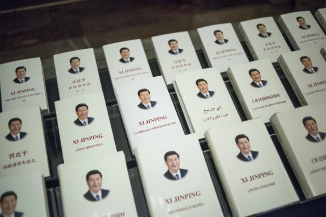 BOOK TOPIC, TOO. Chinese President Xi Jinping's book, translated into foreign languages, is on display during the opening ceremony of a high-level meeting held by the Communist Party of China at the Great Hall of the People on December 1, 2017. Photo by Fred Dufour/Pool/AFP 